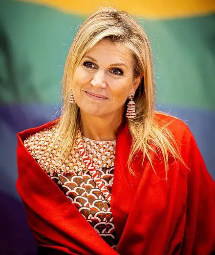 Queen Maxima visited the Roze in Blauw police force. Queen Maxima wore a scale-print silk twill midi dress by Valentino