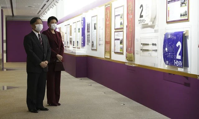 Empress Masako wore a wine red burgundy blazer suit, and ruby earrings. Tenno Sho Autumn Races in Fuchu City