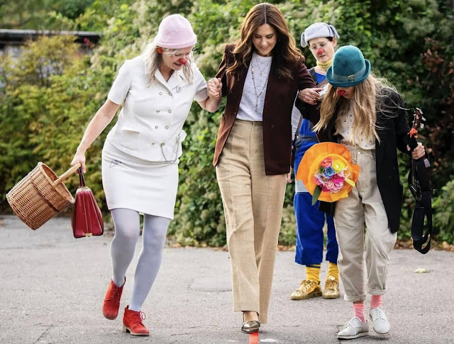 Crown Princess Mary wore mid-rise straight-leg trousers by Ralph Lauren. Malone Souliers Maureen pumps