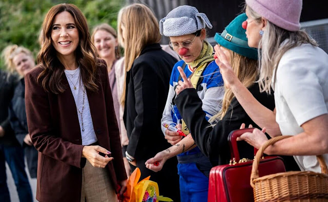 Crown Princess Mary wore mid-rise straight-leg trousers by Ralph Lauren. Malone Souliers Maureen pumps