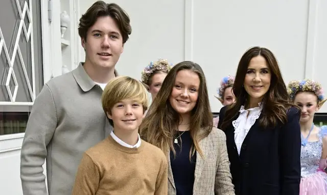 Crown Princess Mary wore a soft white cotton broderie balloon sleeve blouse by Me+Em. Princess Isabella