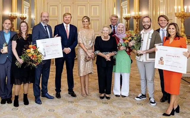 Queen Maxima wore a beige, cream sequin midi dress by Natan. King Willem-Alexander and Princess Beatrix