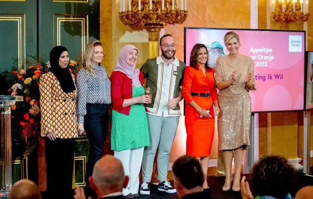 Queen Maxima wore a beige, cream sequin midi dress by Natan. King Willem-Alexander and Princess Beatrix