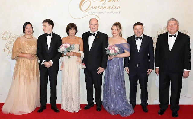 Camille Gottlieb wore a Paz dress by Carolina Soma. Marie Ducruet wore a Parisa gown by Jenny Packham. Princess Stephanie