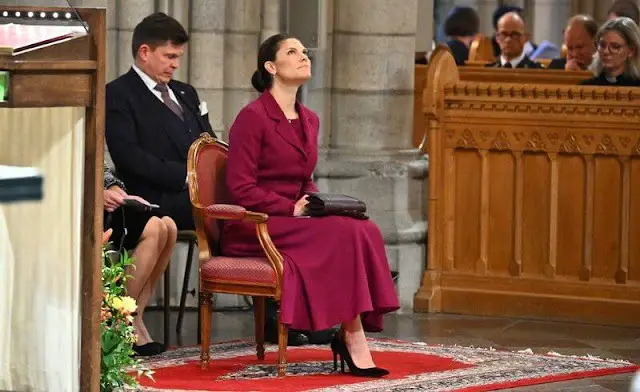 Crown Princess Victoria wore a wine red midi dress by Camilla Thulin, and a red jacket by Andiata