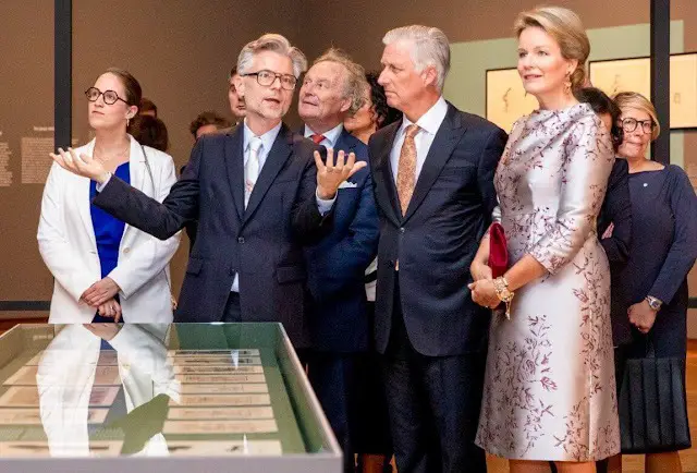 Queen Mathilde wore a floral print silk satin midi dress by Natan. President of Georgia, Salome Nino Zourabichvili