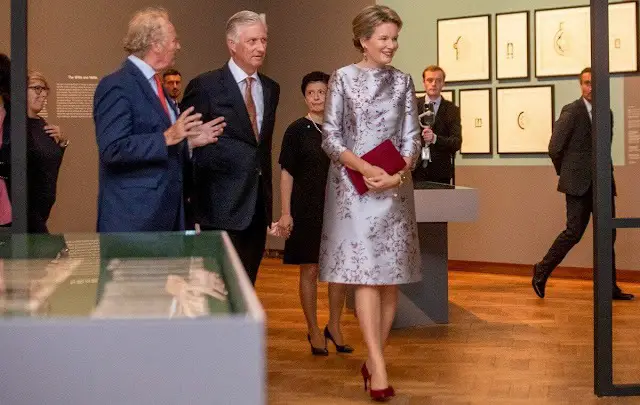 Queen Mathilde wore a floral print silk satin midi dress by Natan. President of Georgia, Salome Nino Zourabichvili