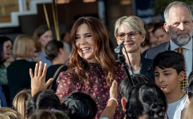 Crown Princess Mary wore a wine red Jacqui B dress by Saloni with navy blue wool coat. Novo Nordisk Foundation