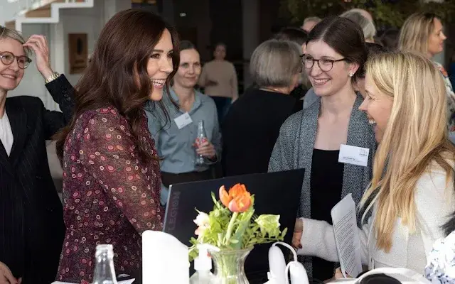 Crown Princess Mary wore a wine red Jacqui B dress by Saloni with navy blue wool coat. Novo Nordisk Foundation