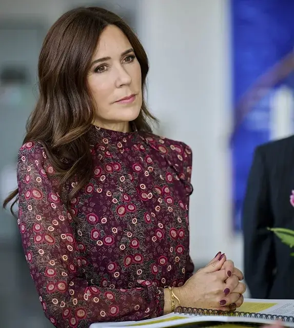 Crown Princess Mary wore a wine red Jacqui B dress by Saloni with navy blue wool coat. Novo Nordisk Foundation