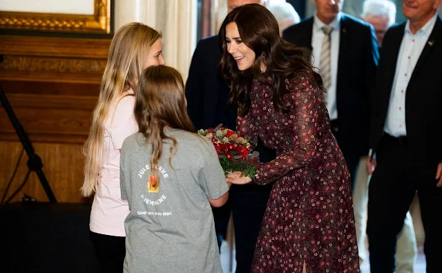 Crown Princess Mary wore a new Jacqui B akina wine dress by Saloni. Count Ingolf and Countess Sussie of Rosenborg