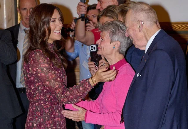 Crown Princess Mary wore a new Jacqui B akina wine dress by Saloni. Count Ingolf and Countess Sussie of Rosenborg