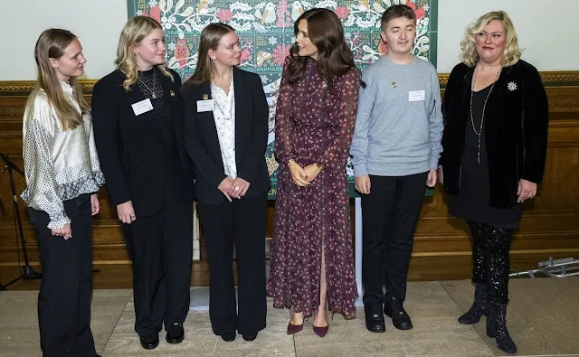 Crown Princess Mary wore a new Jacqui B akina wine dress by Saloni. Count Ingolf and Countess Sussie of Rosenborg