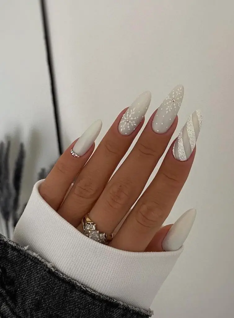 Snowy White Nails with Gem Accents for a Frosty Touch