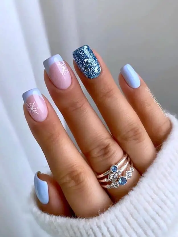 Short Blue Nails with French Tips and a Glamorous Glitter Accent