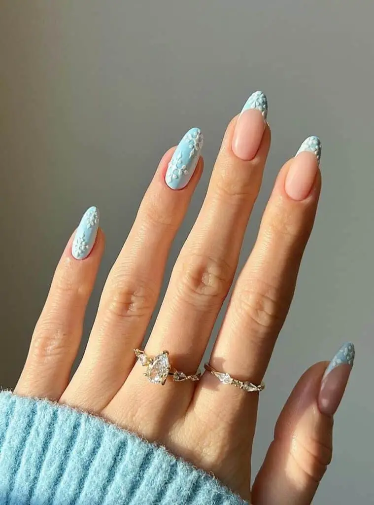 Icy Blue Almond Nails Featuring Striking 3-D Snowflakes