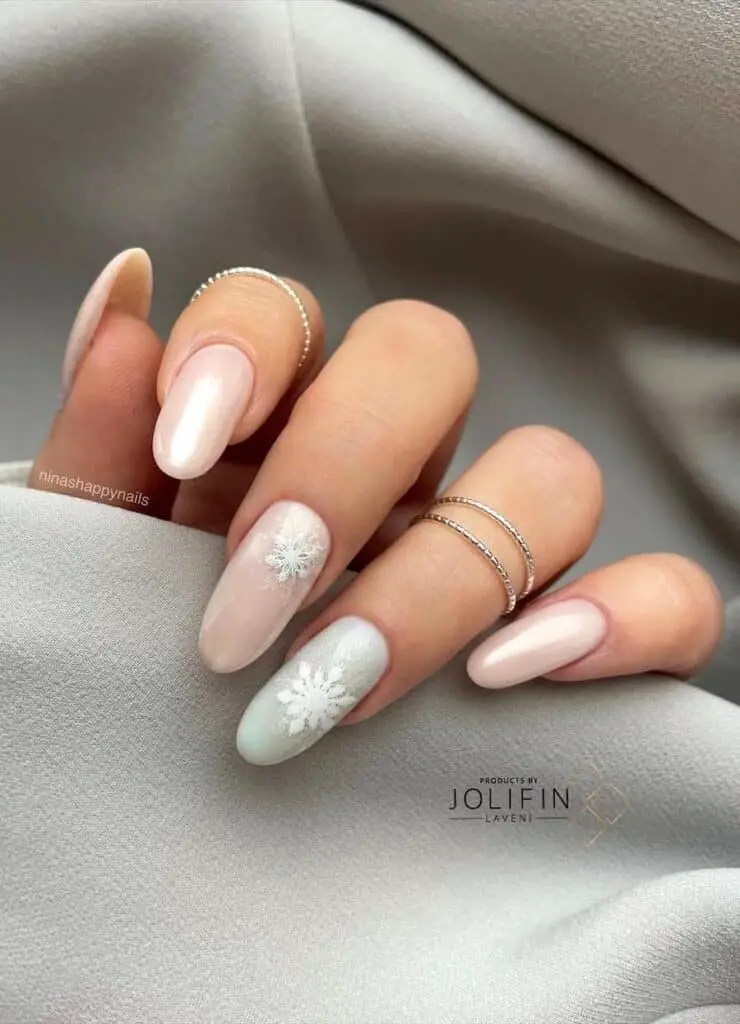 Blush Nails with a Subtle Light Blue Accent for Elegance