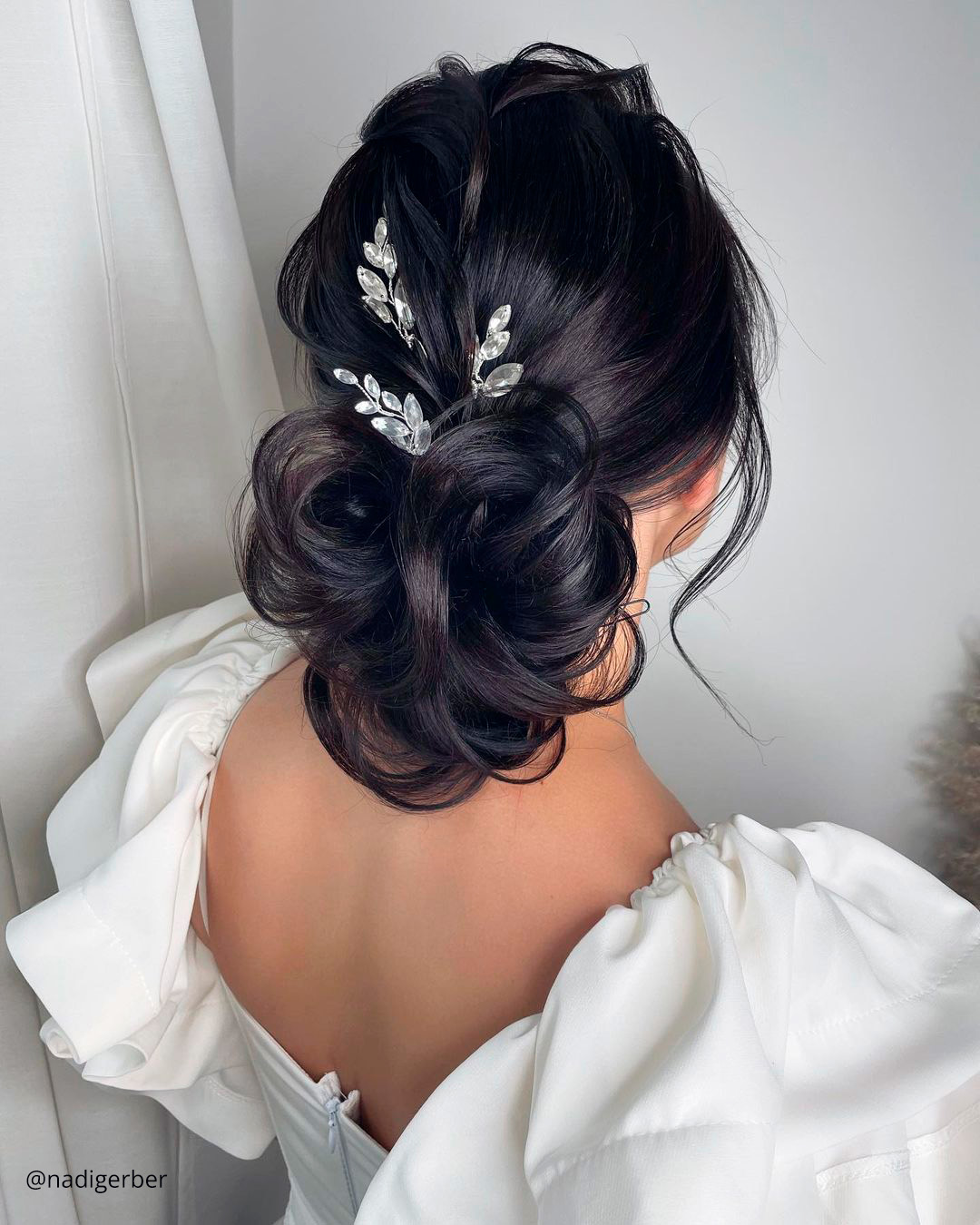 winter wedding hairstyles elegant low bun with crystals nadigerber