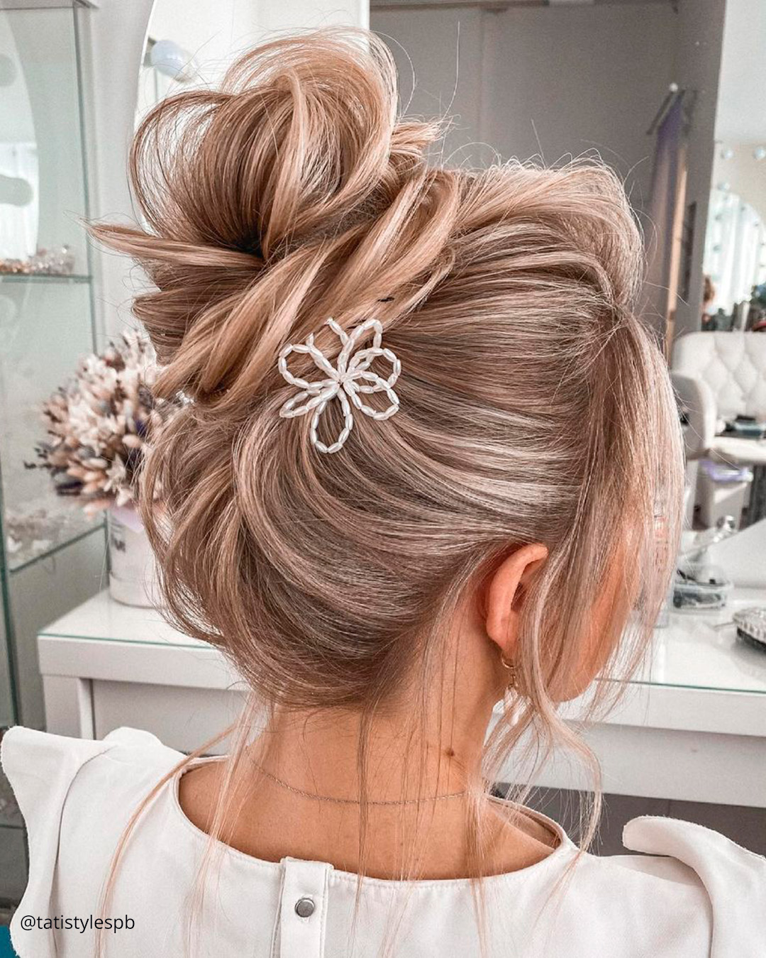 winter wedding hairstyles high bun with white pin tatistylespb