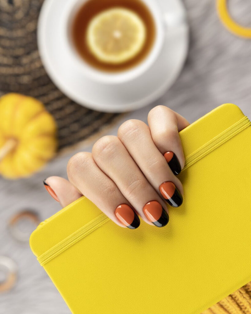 Black and Orange Nails: Edgy and Bold Thanksgiving Style