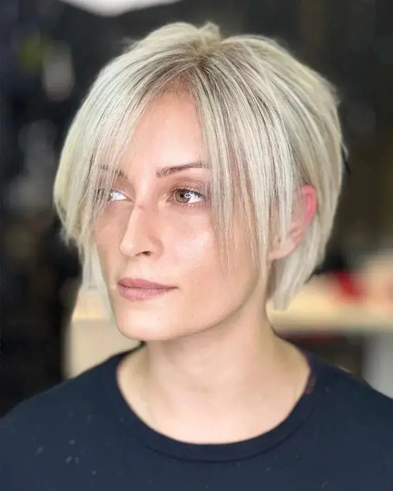 Pixie Bob with Long Side Bangs: Playful and Chic for Thinner Hair