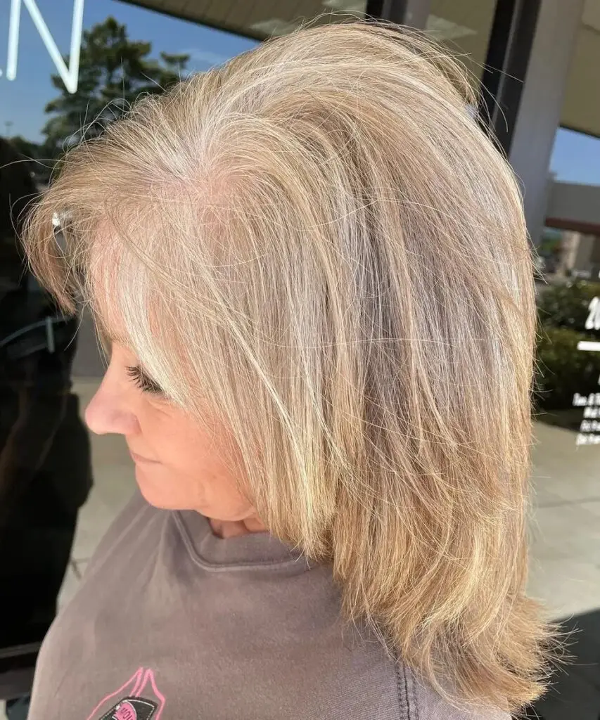 Medium Layered Cut: Enhance Thinning Hair with Volume and Style