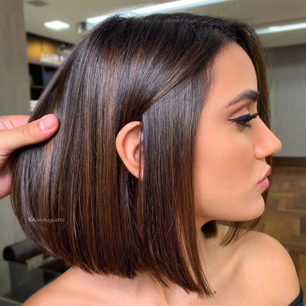 Glowing Elegance: The Shiny Golden-Brown Bob - Gorgeous Highlights for Short Hair