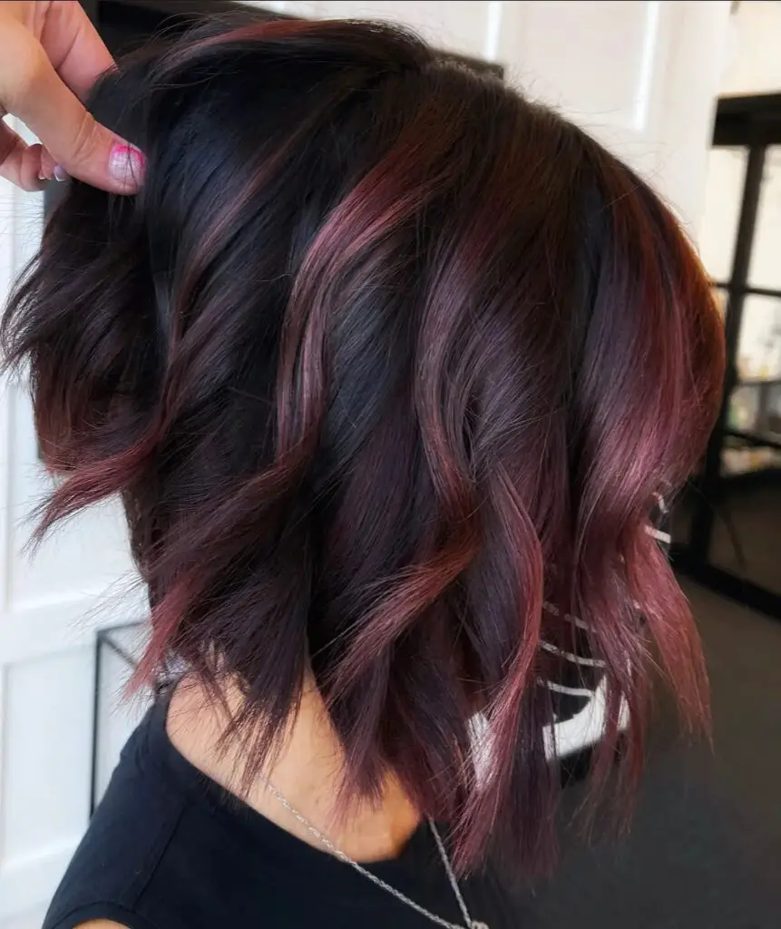 Maroon Teasylights Transform the Inverted Wavy Bob