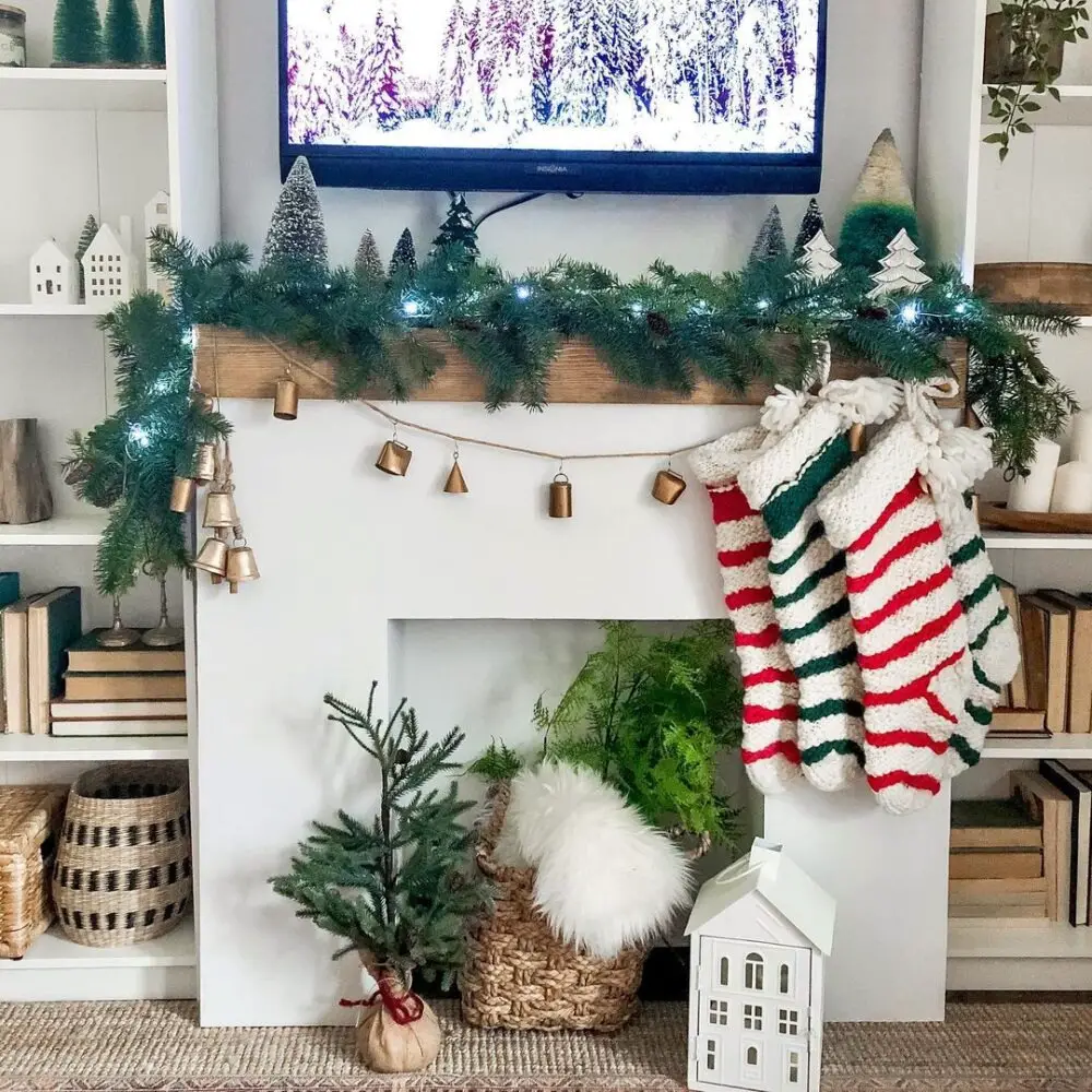 Striped Elegance: Christmas Stockings and Gold Bells Garland Ideas