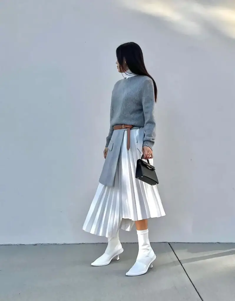 Pleated Skirt Perfection: White Boots Edition