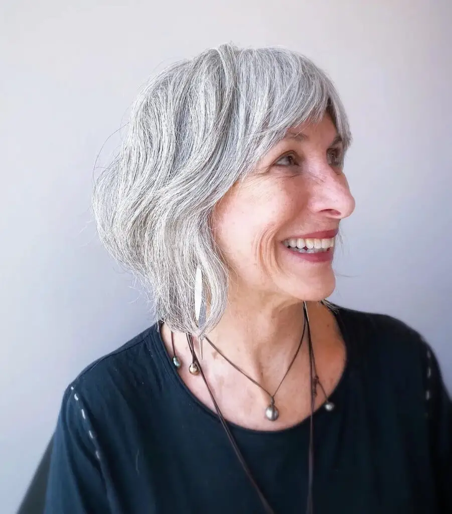 Silver Elegance: Medium Shag with Arched Bangs