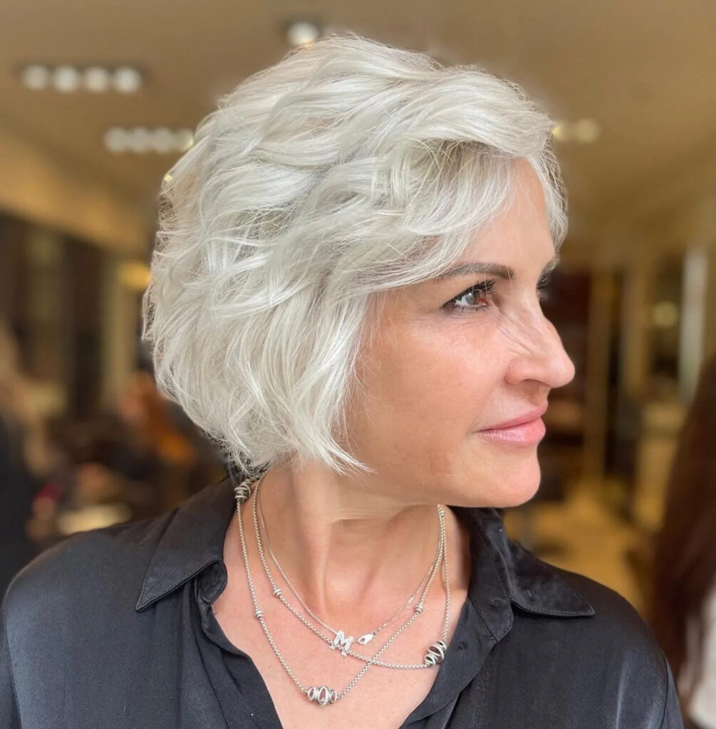 Platinum Elegance: Layered Bob Shag in Blonde