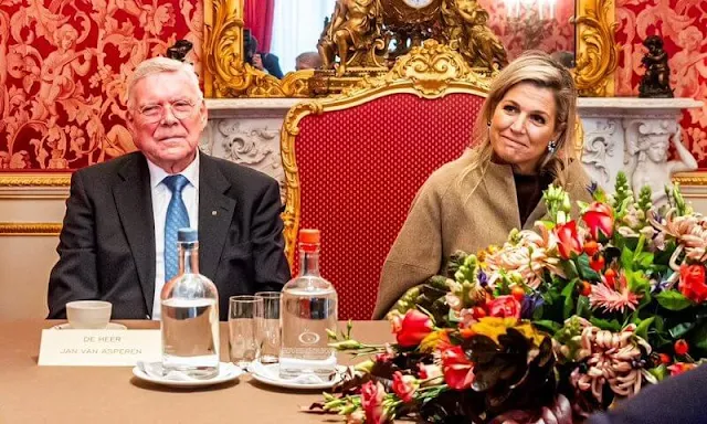 Queen Maxima wore a  beige jacket, navy top and, navy and beige skirt from Natan Couture at Noordeinde Palace