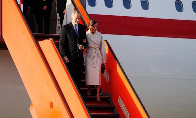 Queen Letizia wore long belted wool coat by & Other Stories. Crown Princess Mary wore a green coat by The Fold