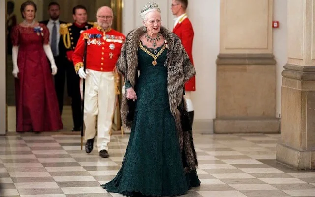 Queen Letizia wearing Felipe Varela navy gown. Crown Princess Mary wearing Lasse Spangenberg gown