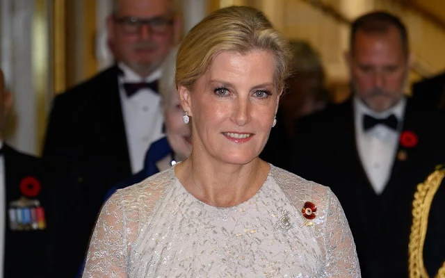 The Duchess of Edinburgh wore a Lindsay pleated lace gown by Erdem. The Duchess wore a wool jacket by Bally