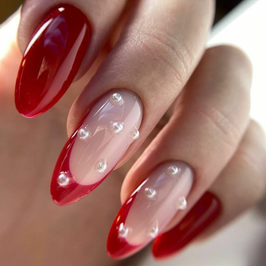 Valentine's Day Nail Ideas 2024: Adorned with Pearls: Luxurious Touch on Red and Pink Nails