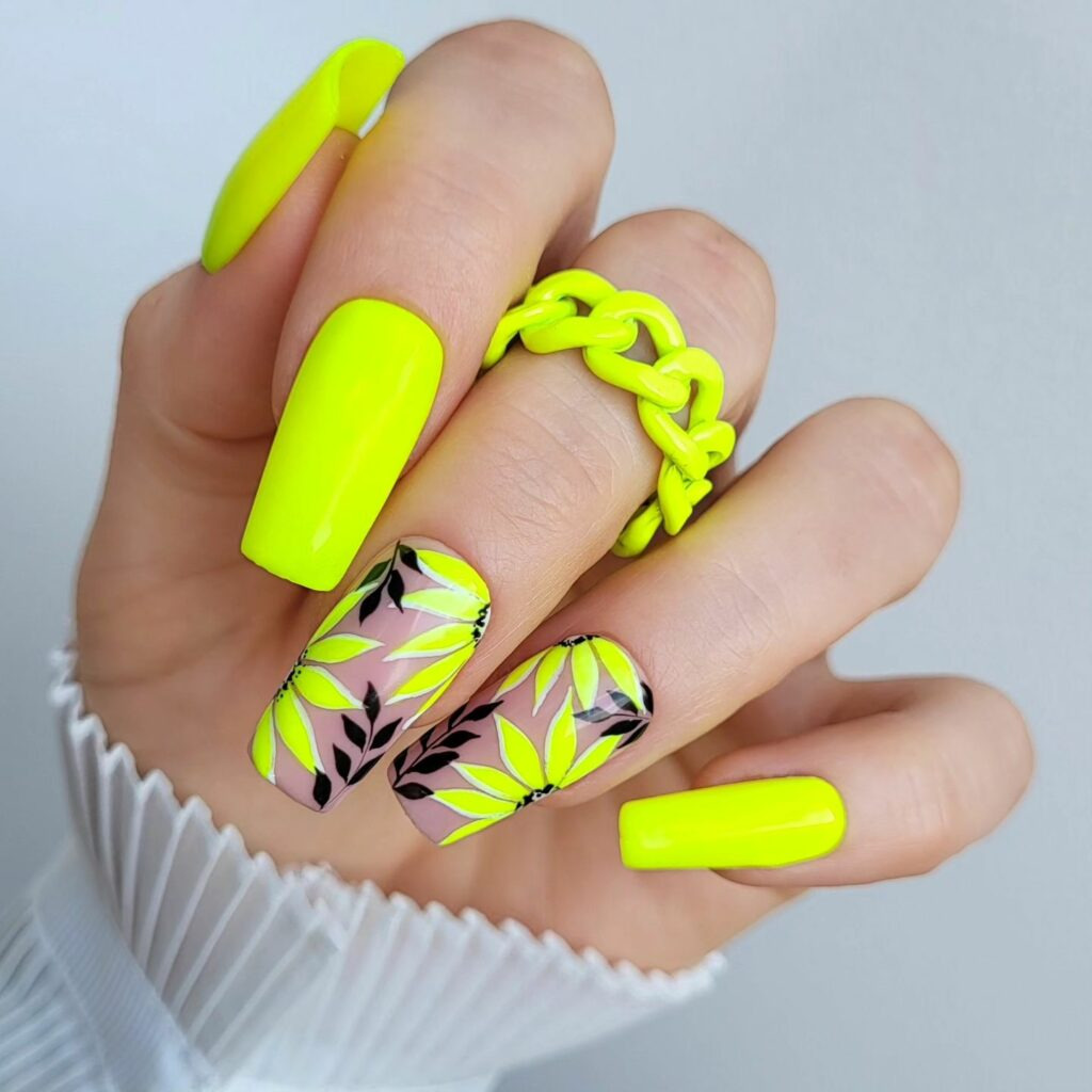 Abstract Neon Yellow Nails With Flower Accents - Nail Art Inspiration