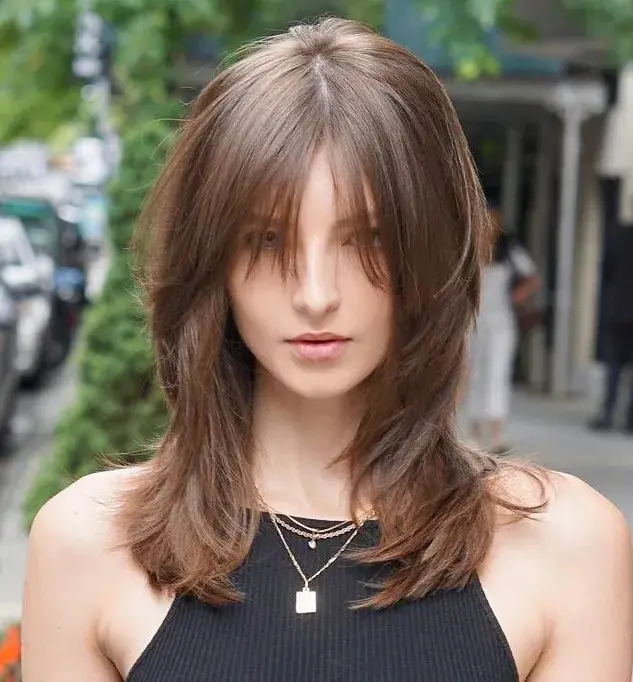 Trendy Appeal: Piece-y Layers and Elongated Bangs