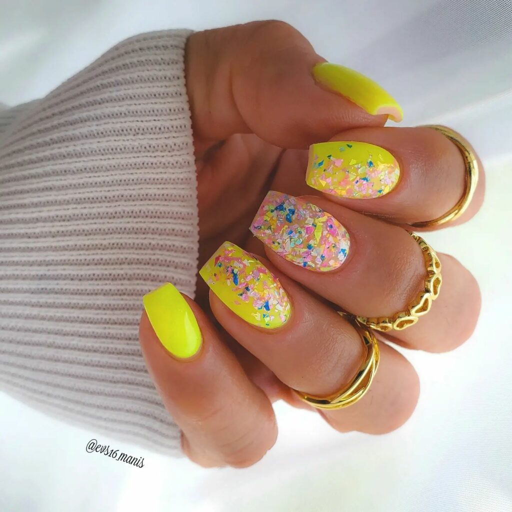 Fun and Festive Neon Yellow Nails With Confetti Design