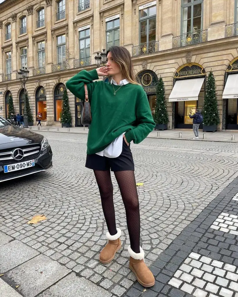 Stylish Contrast: Green Sweater, Shorts, Sheer Tights, and Fluffy Ugg Boots