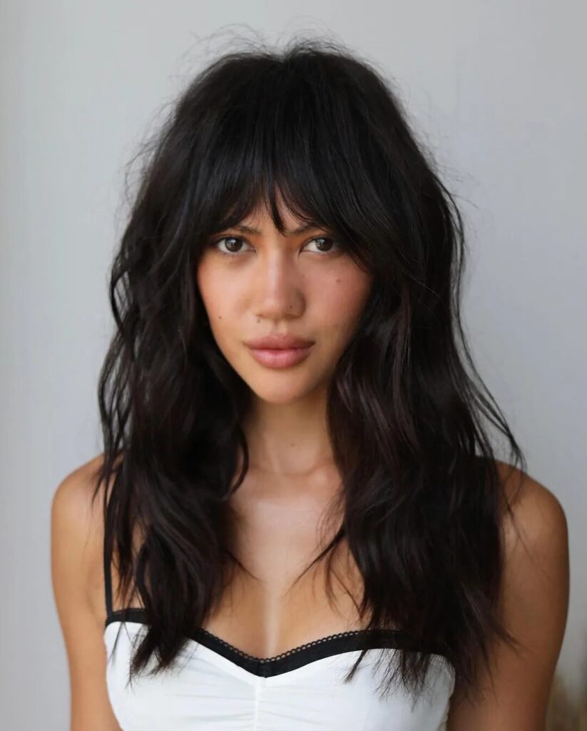 Best Haircuts For Triangle Face Shape;  Chic: Long Shaggy Wolf Cut