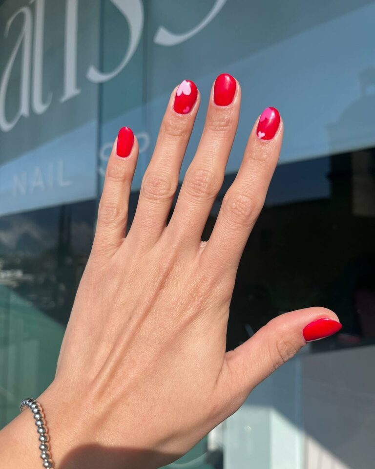 Short Valentine’s Nail Designs 2024 / Cute and Sassy: Short Valentine’s Nails in Red with Adorable Heart Accents