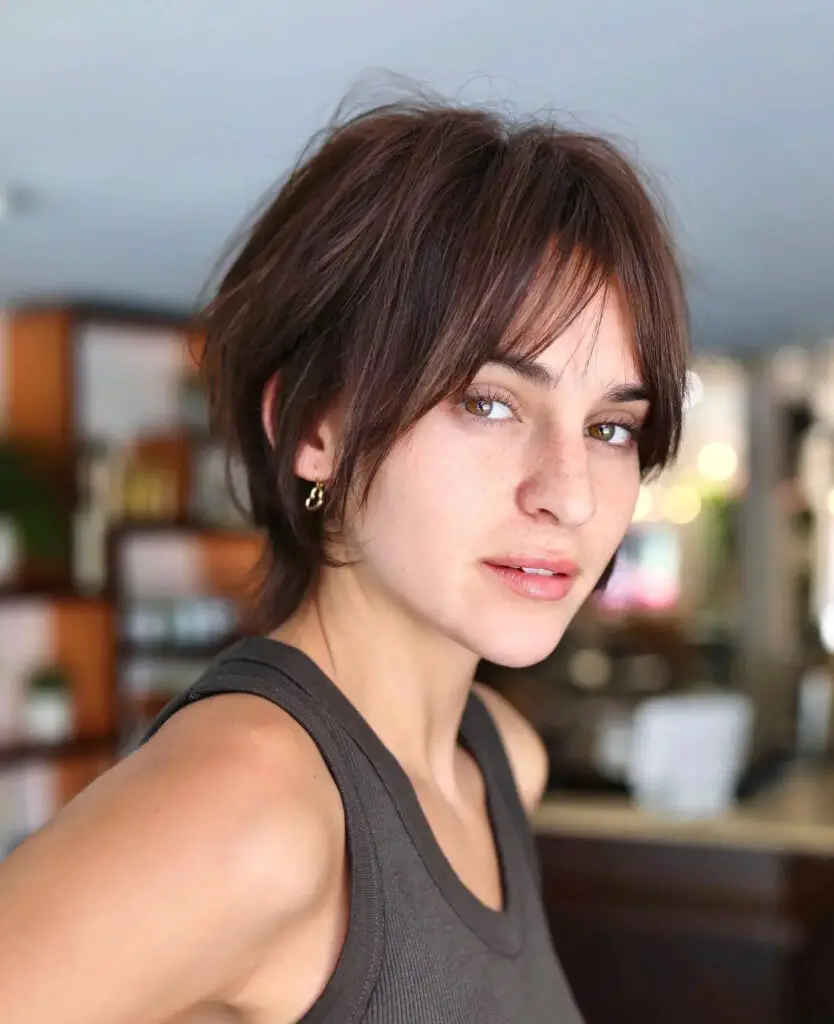 Contemporary Elegance: Modern Brunette Pixie for Oval Faces