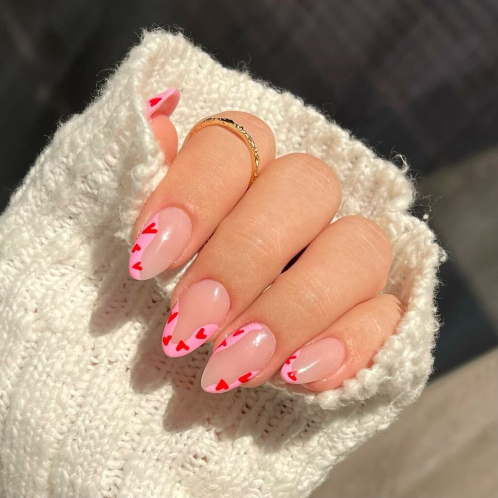 Valentine's Day Nail Ideas 2024: French Heart Nail Art: Captivating Red and Pink Designs