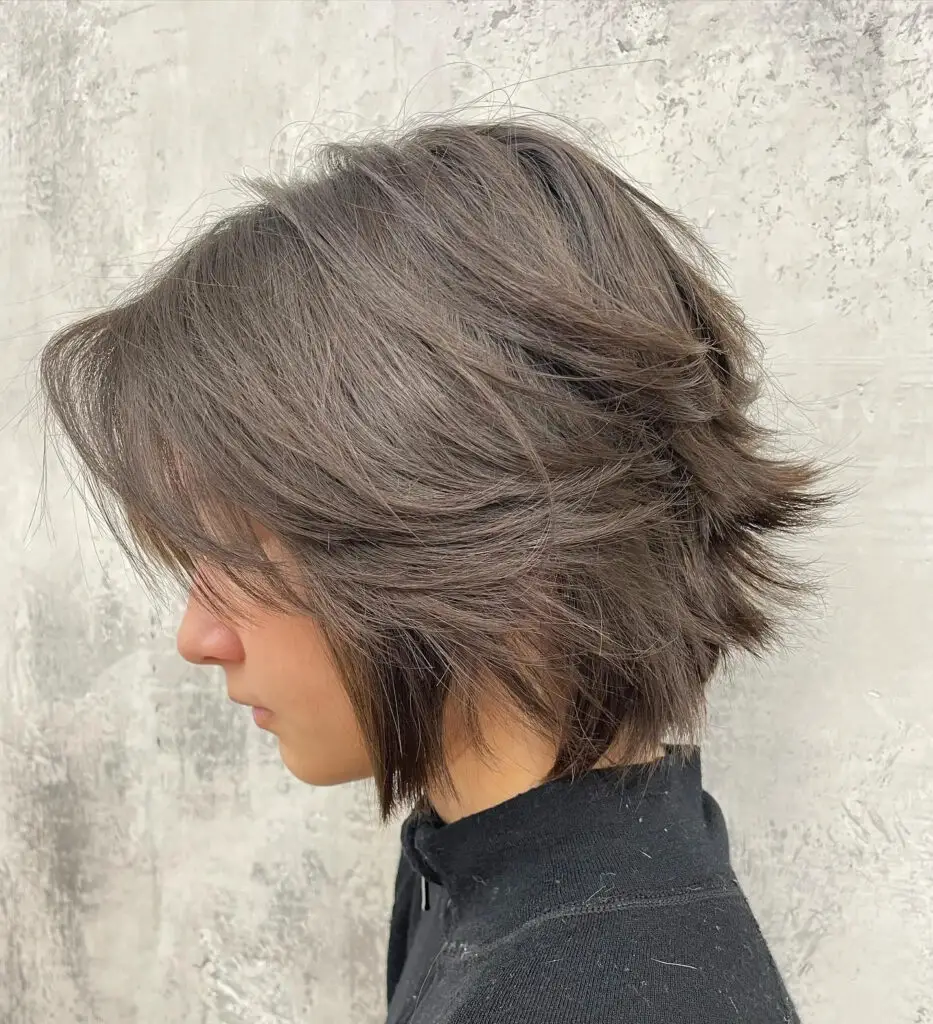 Textured Elegance: Stylish Variations of the Wolf Cut