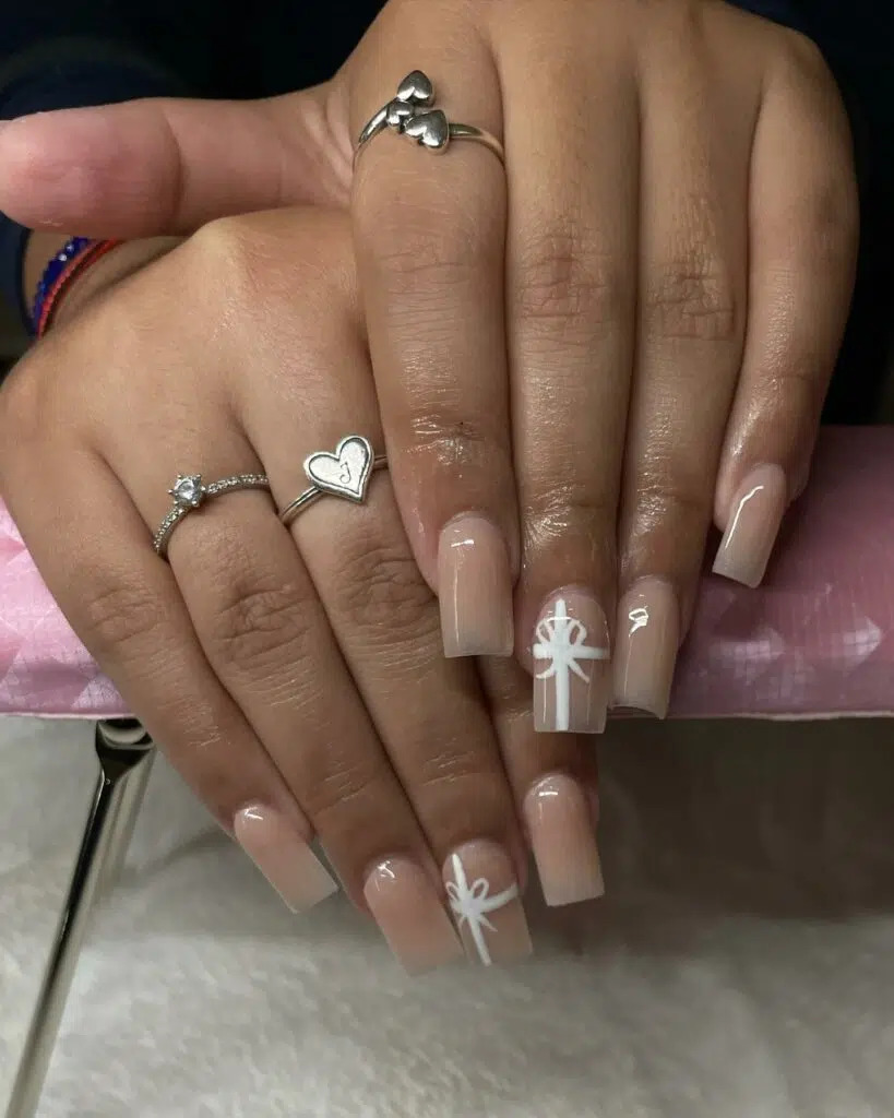 Nude Elegance: Christmas Coffin Nail Ideas