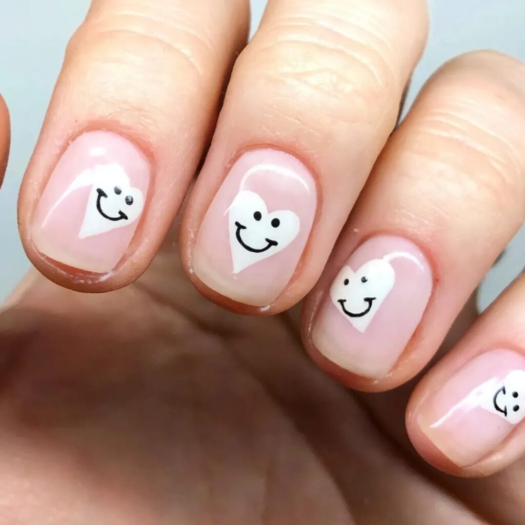 Short Valentine’s Nail Designs 2024 / Smiley Hearts Nails: Bring Joy to Your Valentine’s Look