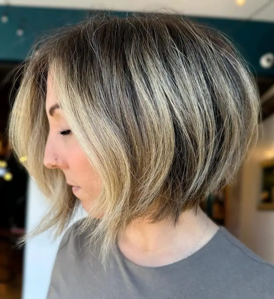 Rounded Bob Brilliance: Volumizing Haircuts with Highlights