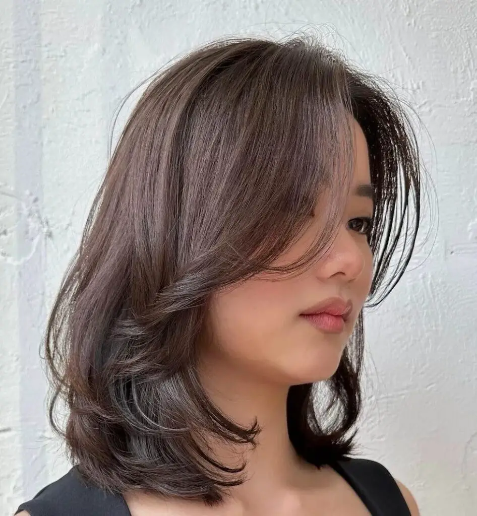 Elegance Redefined: Volumizing Lob for Thin Strands